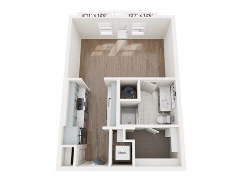 E1 A top down view of a small apartment with a kitchen, living room and bathroom.